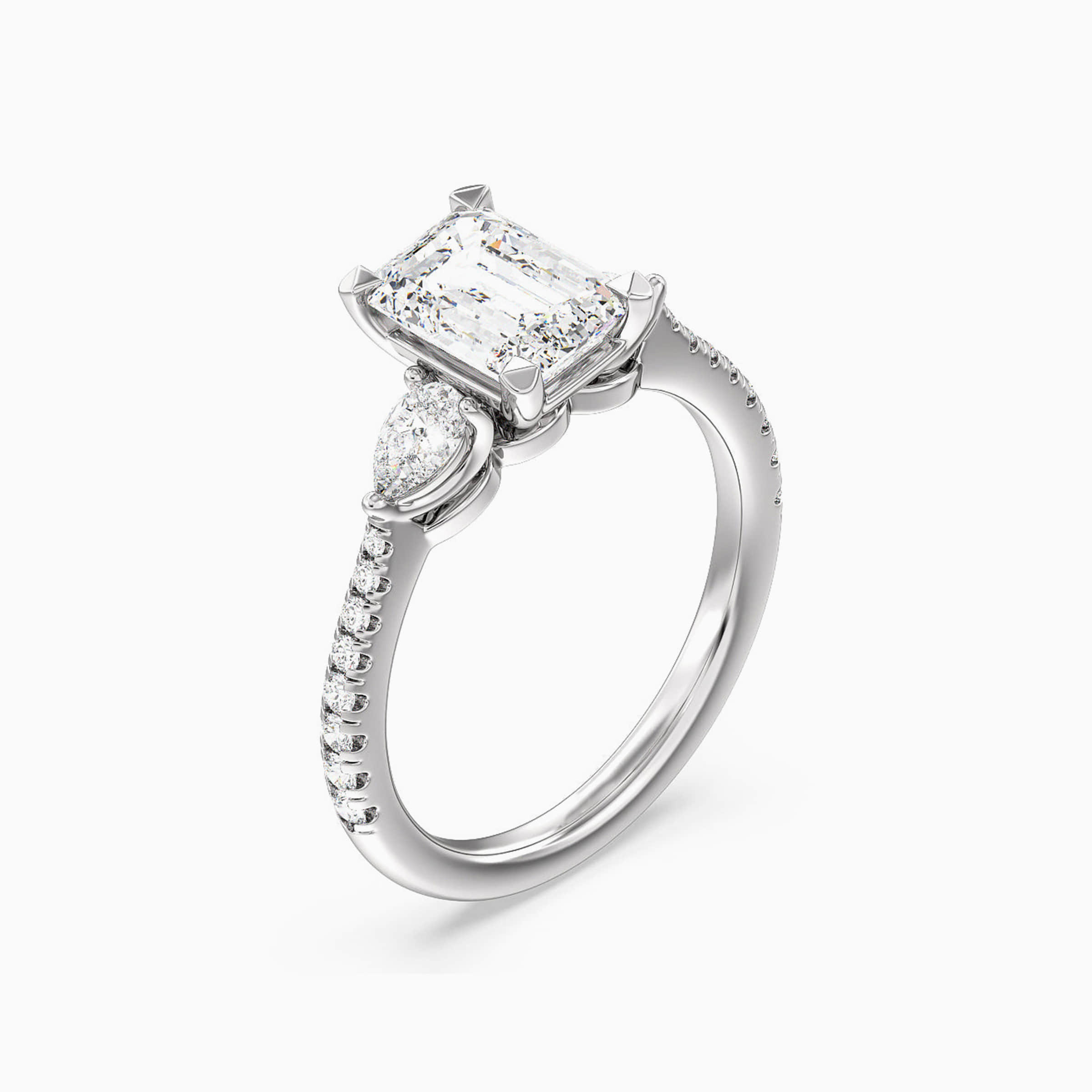 Darry Ring three stone emerald cut engagement ring in platinum