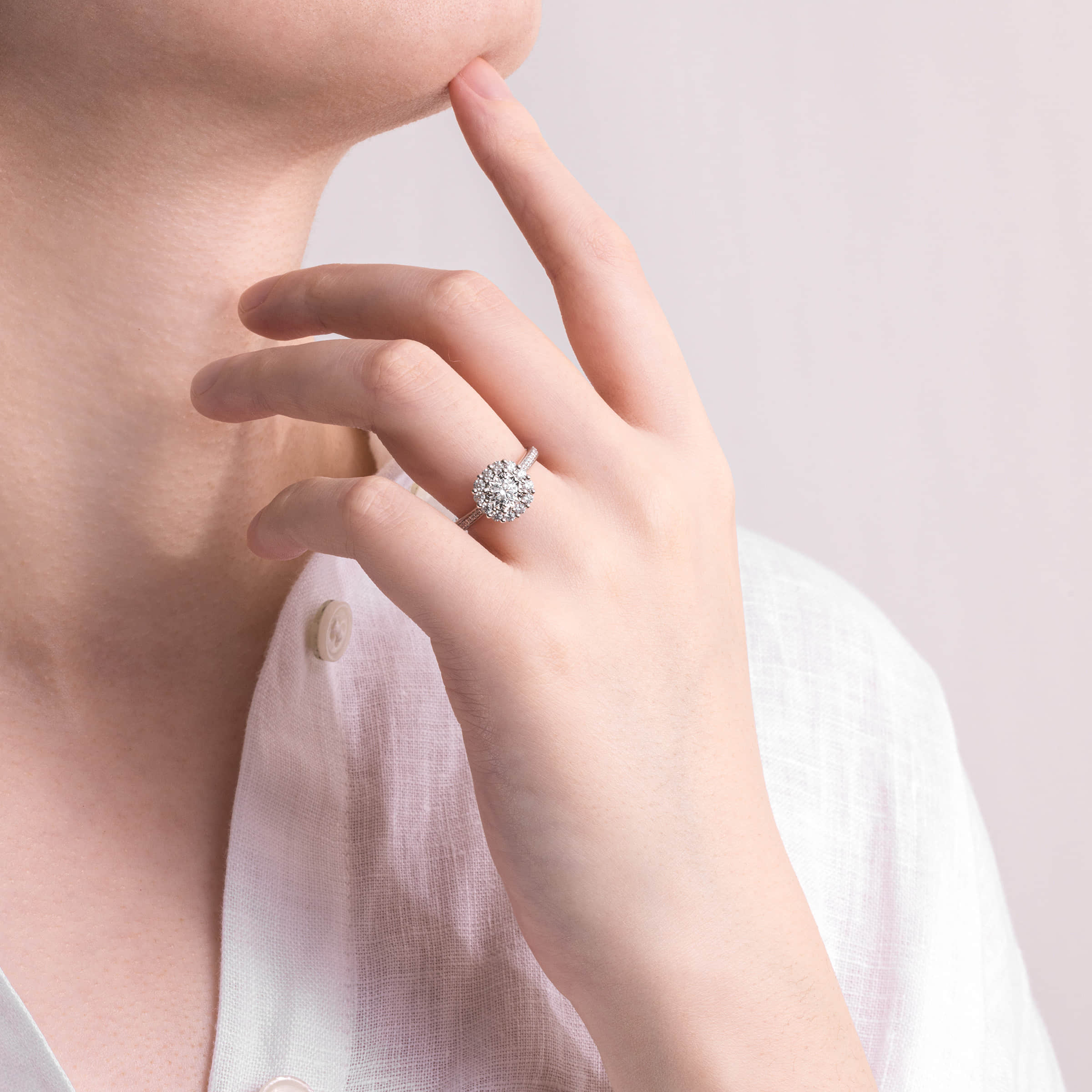 Darry Ring diamond halo promise ring on finger