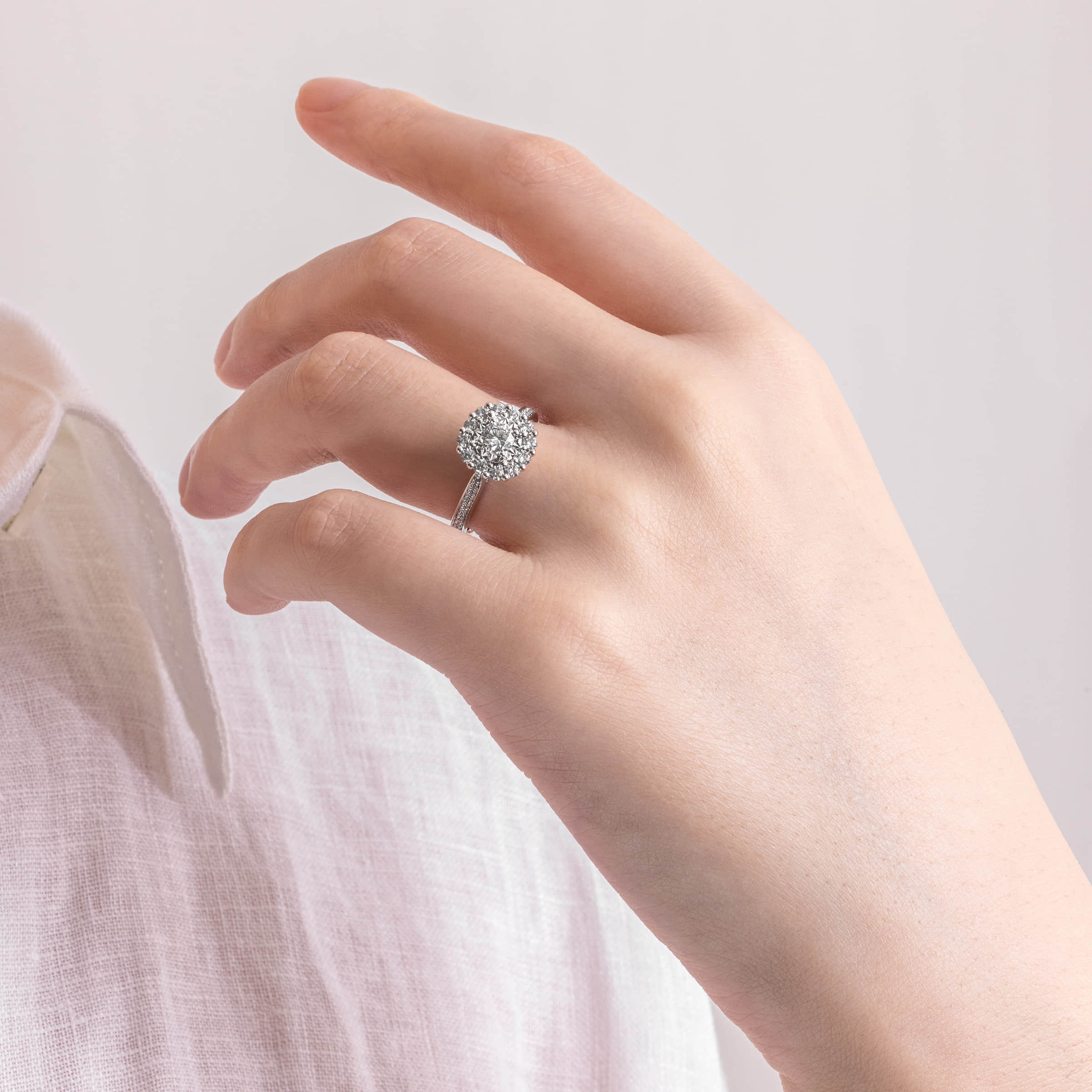 Darry Ring diamond halo promise ring on finger