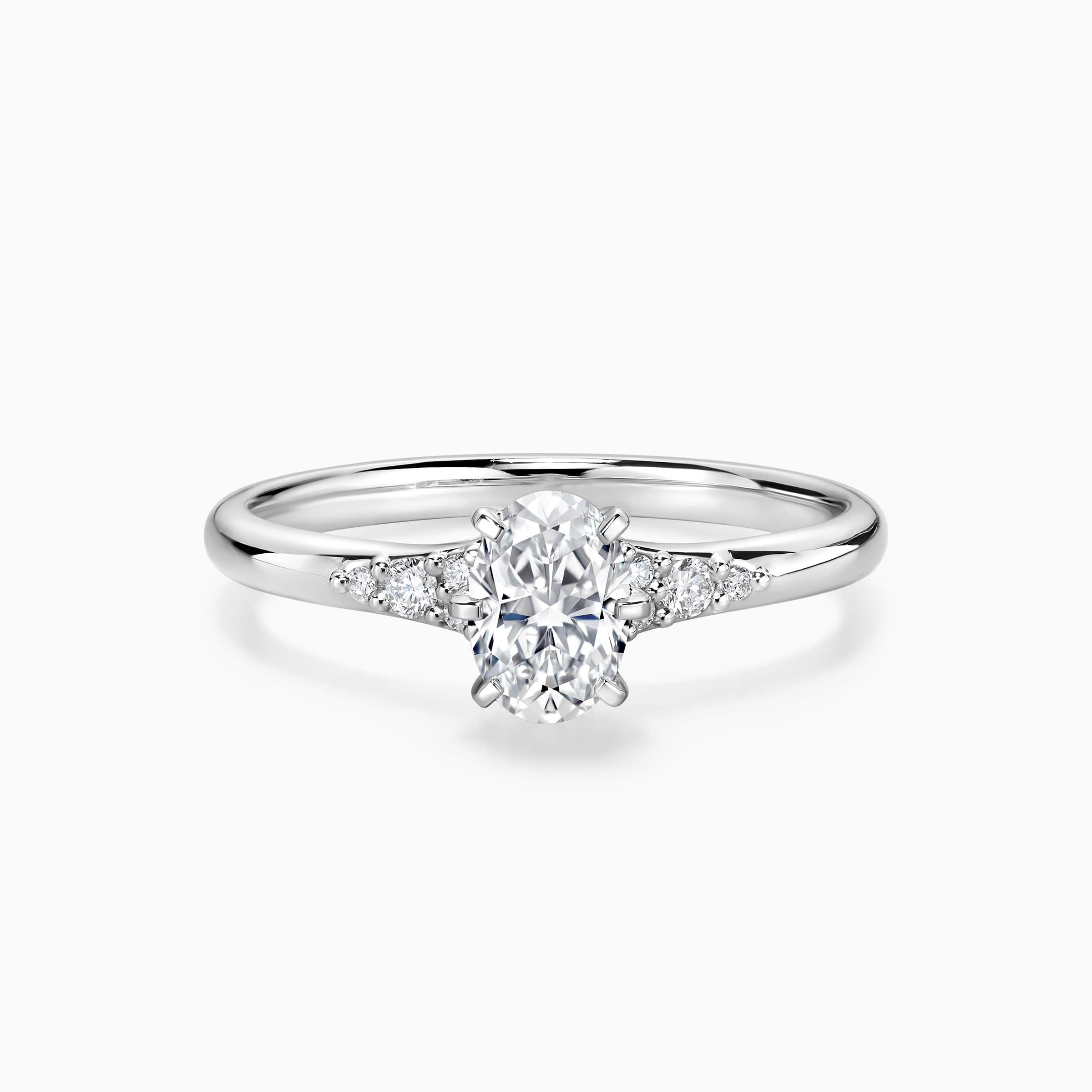 Darry Ring oval cut promise ring wirh side stones in white gold