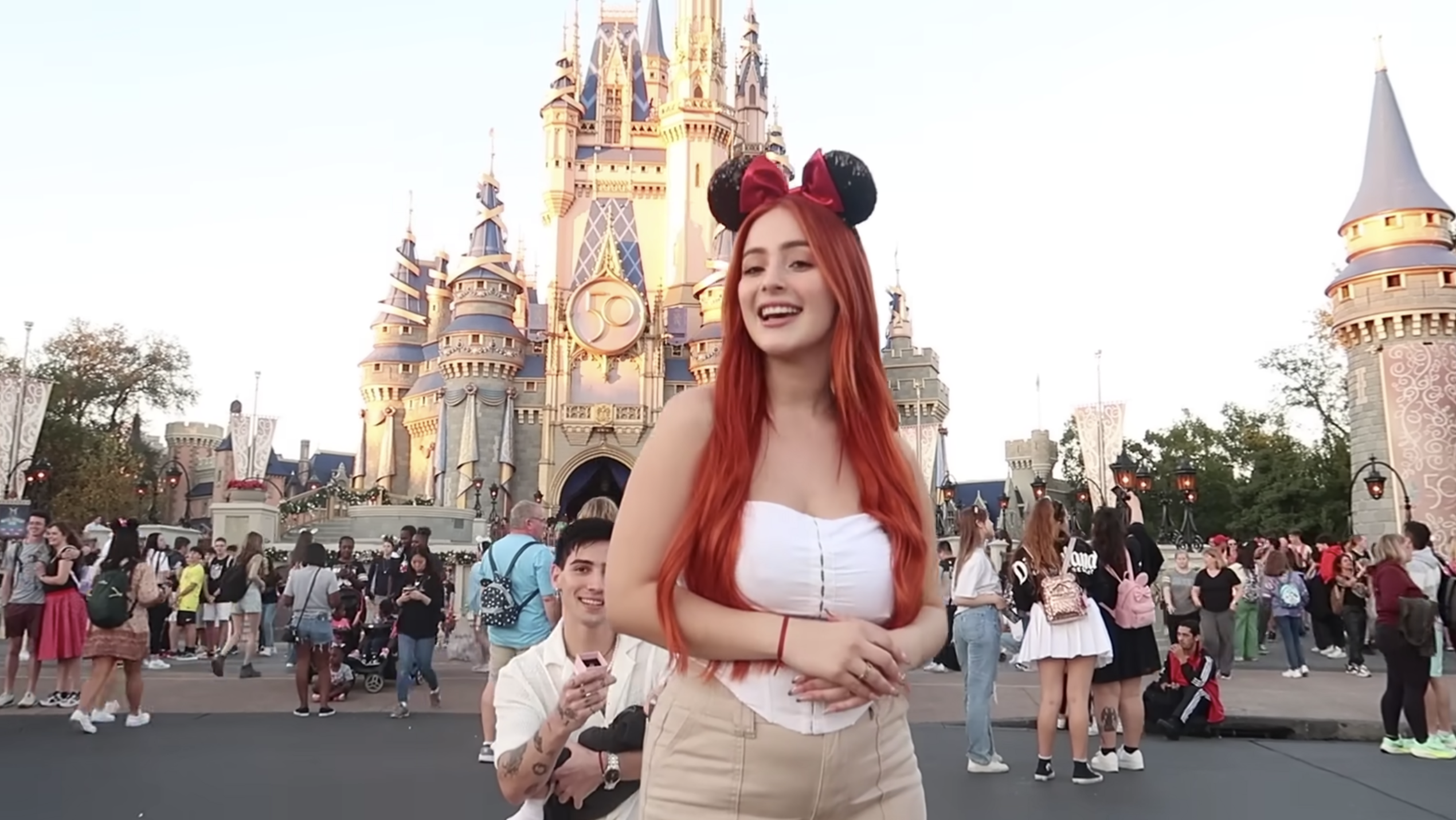 disney proposal in front of the cinderella castle