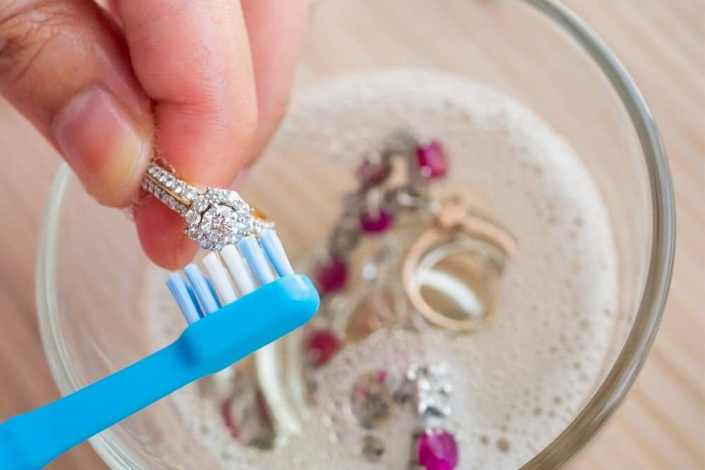 Use a soft toothbrush to remove residue from the ring
