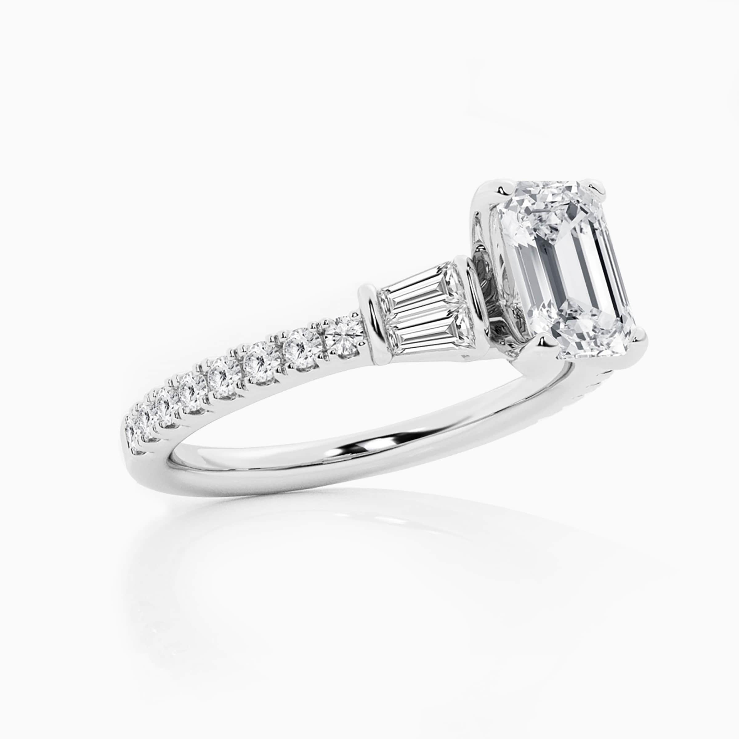 Darry Ring emerald cut three stone engagement ring in platinum
