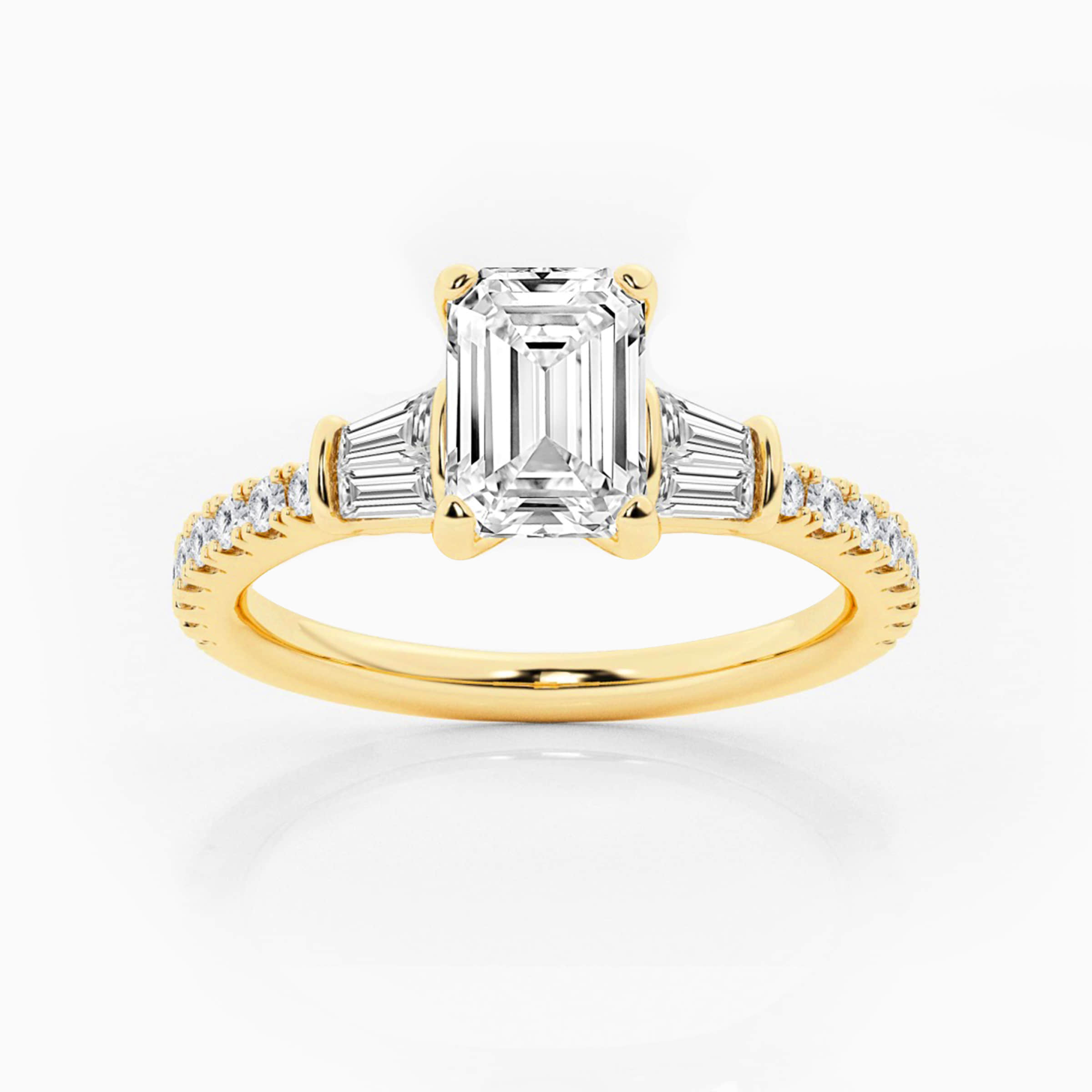 Darry Ring emerald cut three stone engagement ring yellow gold
