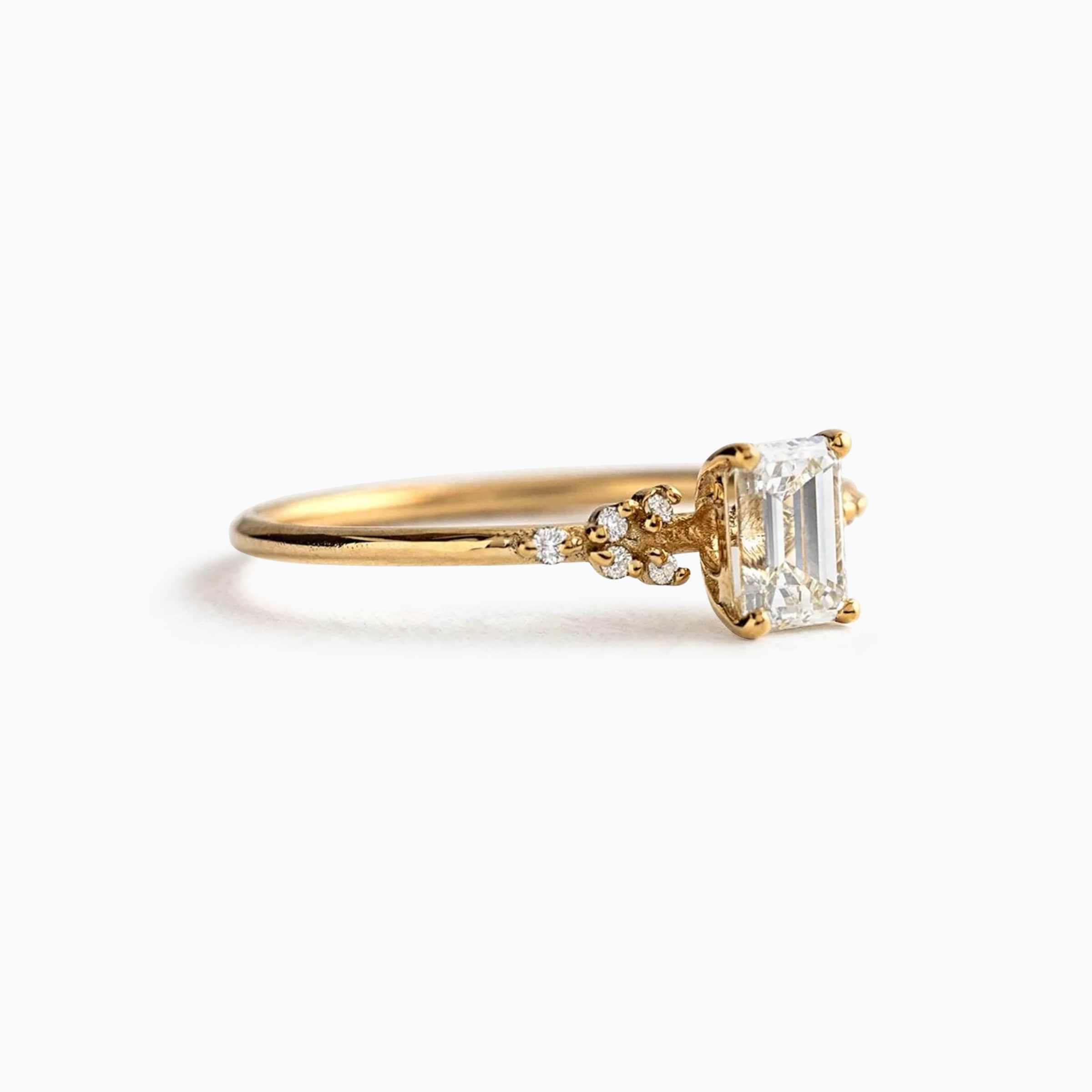 Darry Ring antiuqe emerald cut engagement ring yellow gold in side view