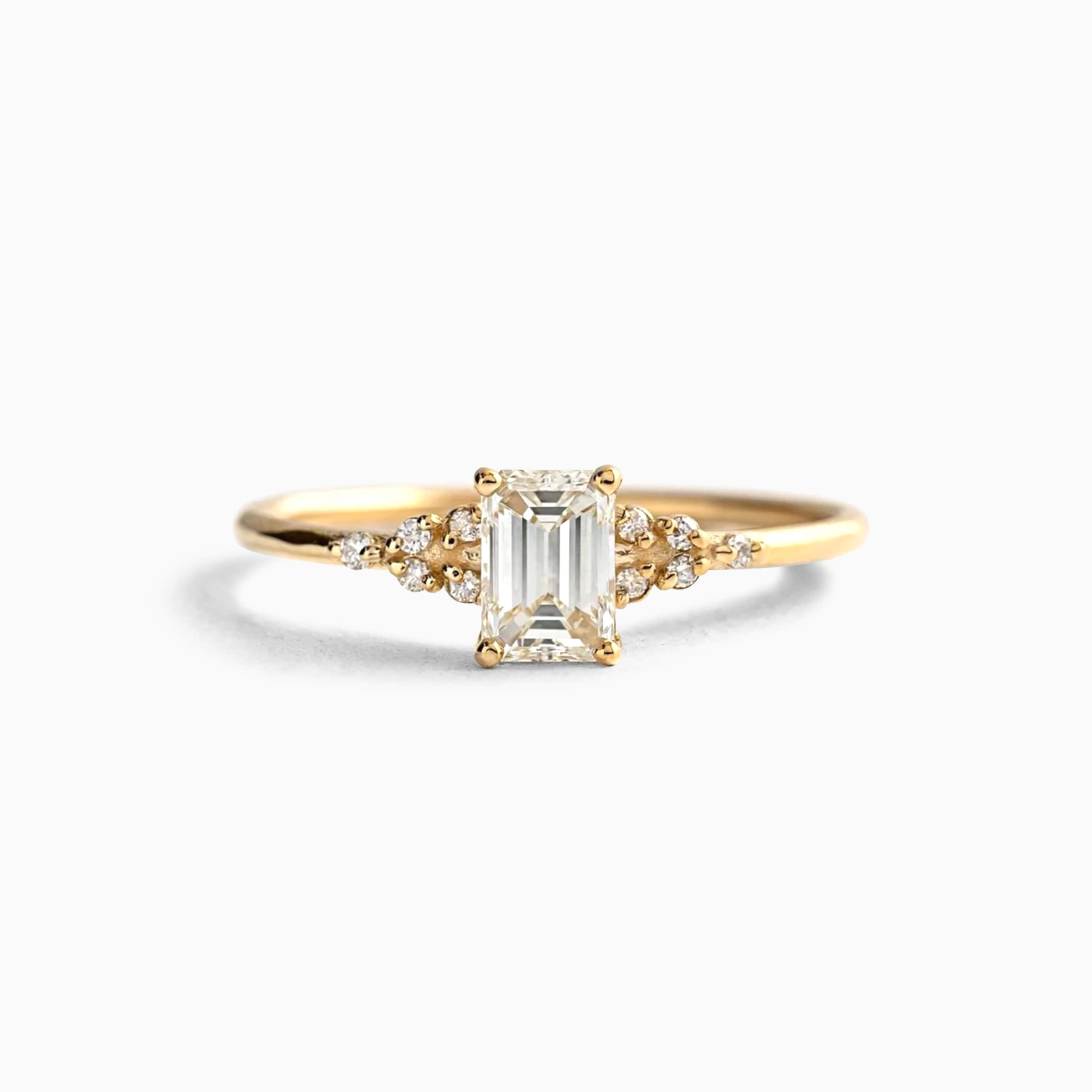 Darry Ring antiuqe emerald cut engagement ring in yellow gold