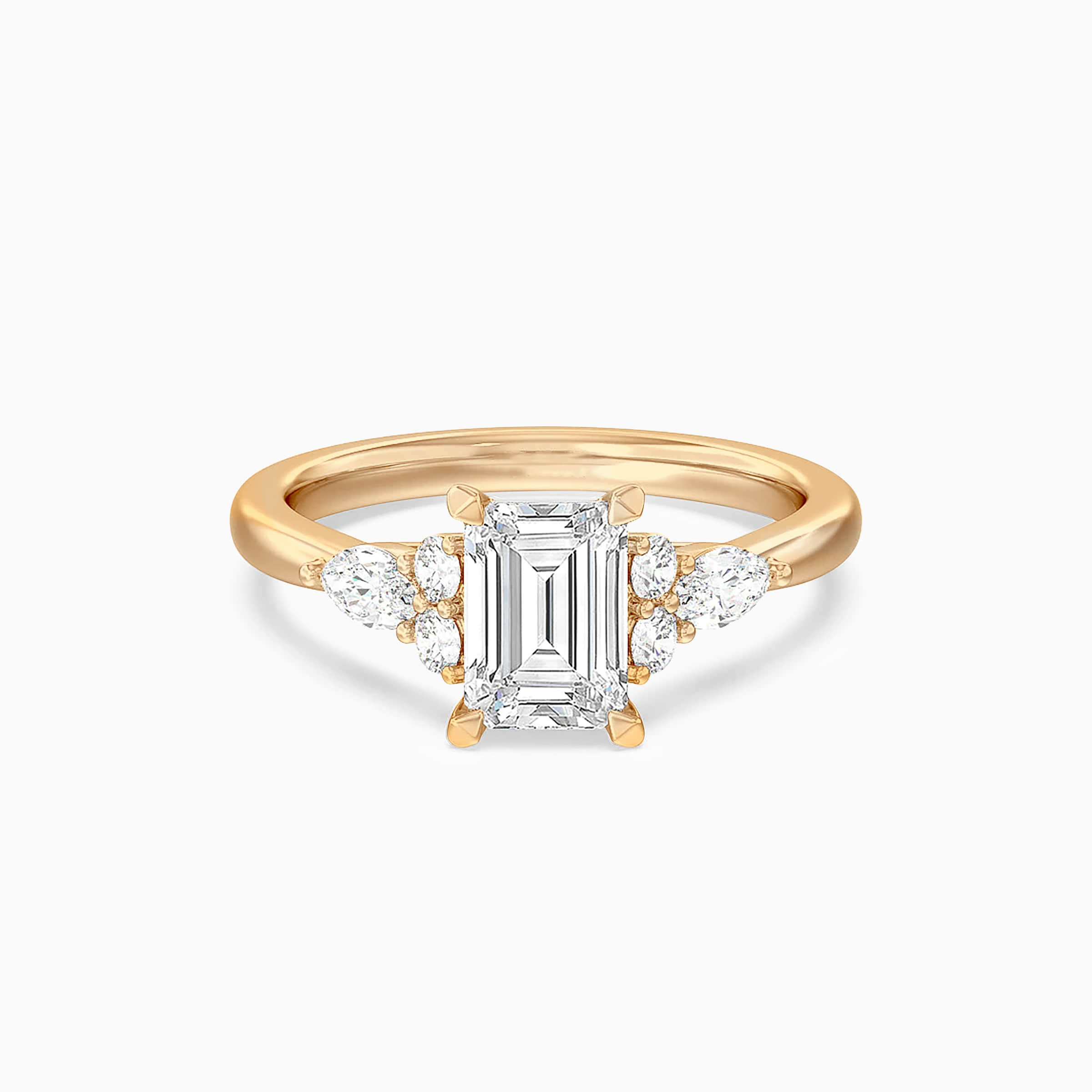 Darry Ring emerald cut engagement ring with side stones in yellow gold
