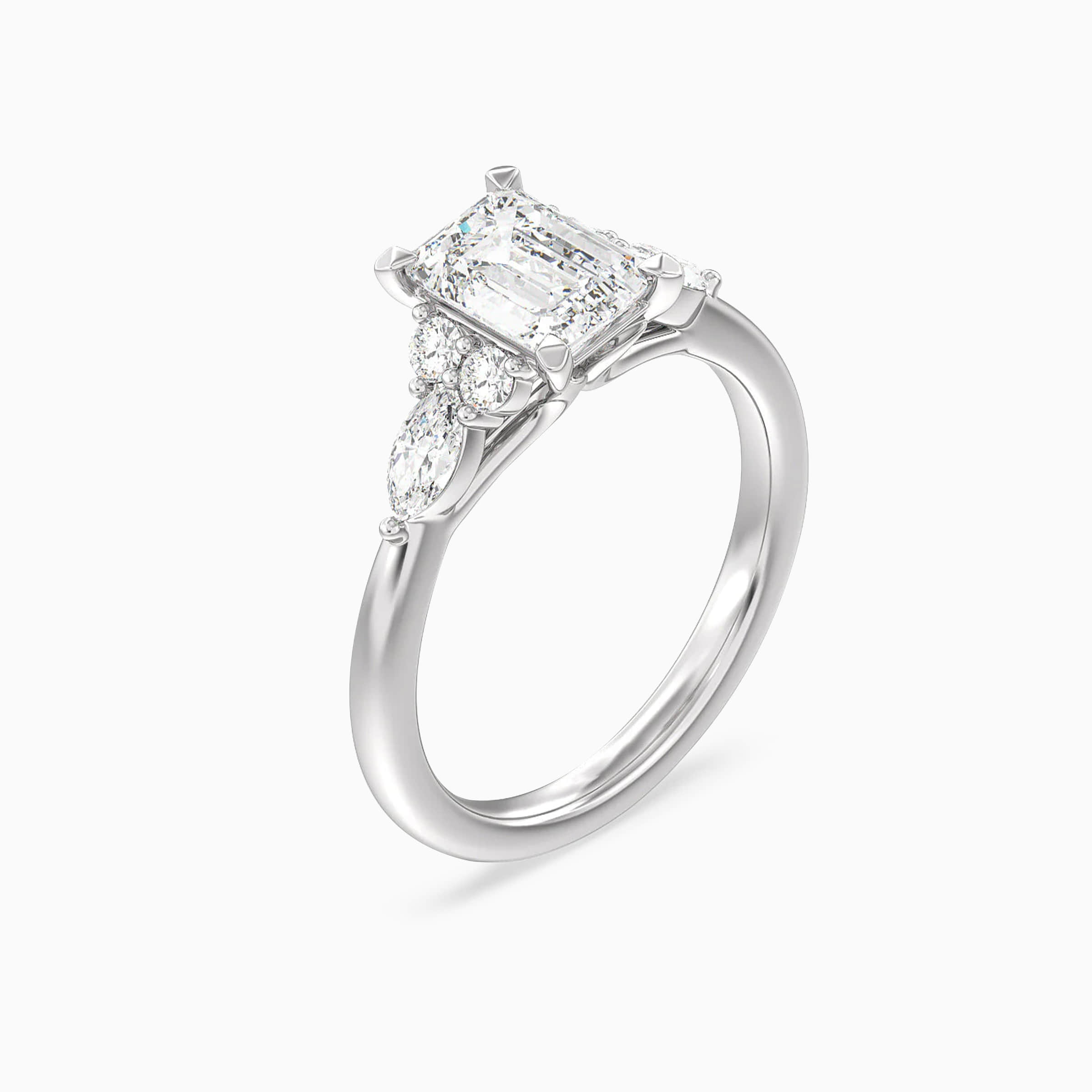 Darry Ring emerald cut engagement ring with side stones in platinum