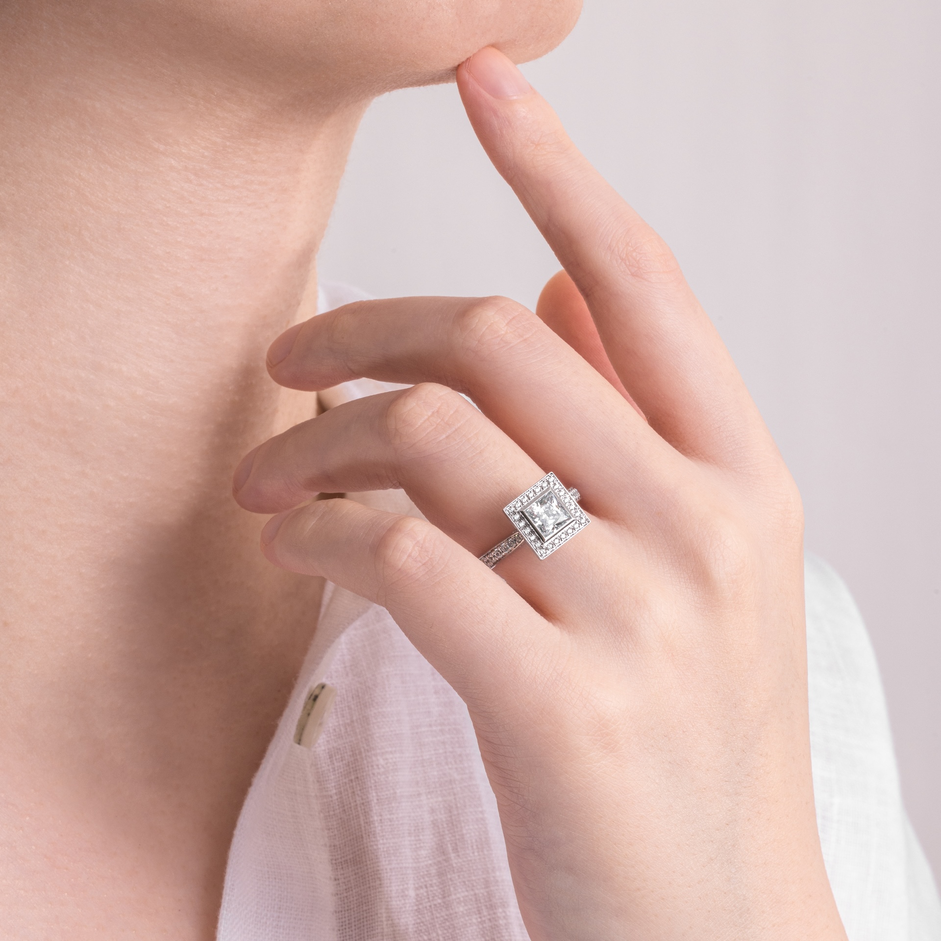 bezel setting engagement ring on hand